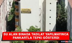 Su Alan Binada Tadilat Yapılmayınca Pankartla Tepki Gösterdi