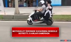 Motosiklet Üzerinde Kucağında Bebekle Seyretti: O Anlar Kamerada