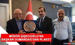 Müdür Şişecioğlu’na, Başkan Dumandağ’dan Plaket