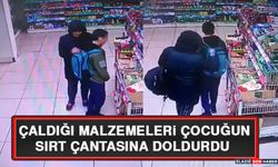 Çaldığı Malzemeleri Çocuğun Sırt Çantasına Doldurdu