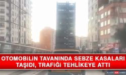 Otomobilin Tavanında Sebze Kasaları Taşıdı, Trafiği Tehlikeye Attı