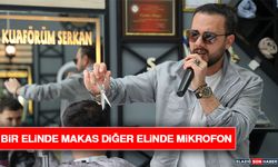 Bir Elinde Makas Diğer Elinde Mikrofon