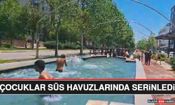 Çocuklar Süs Havuzlarında Serinledi