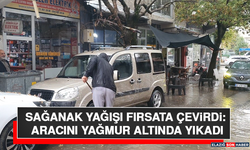 Sağanak Yağışı Fırsata Çevirdi: Aracını Yağmur Altında Yıkadı